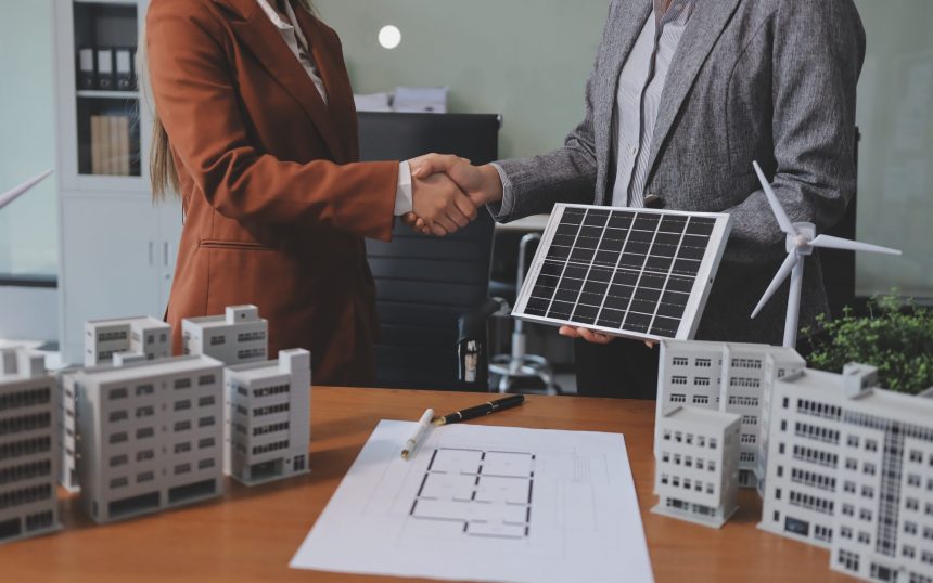 Discussion among businesspeople on the latest developments in solar cell panel technology and Solar Energy Environment city Concept.