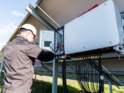 The inspector checks the actual output voltage level of inverter.