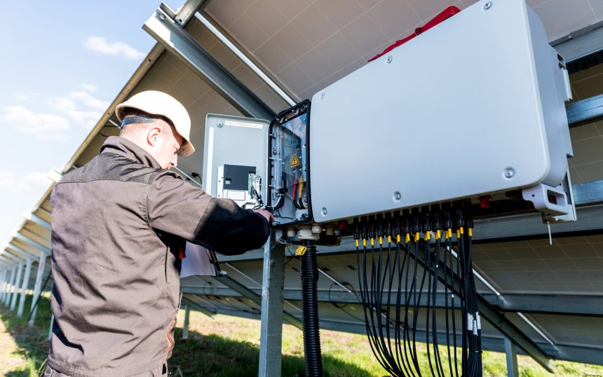 The inspector checks the actual output voltage level of inverter.